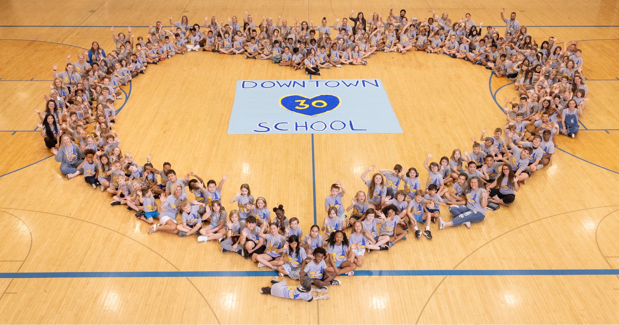 Students in a heart shape 2024